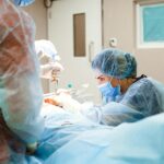 "Patient preparing for surgery with healthcare provider's guidance, illustrating comprehensive healthcare tips for successful surgery."